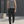 Black zip pocket gym joggers worn front walking view, drawstring waist and white sneakers outdoors
