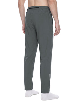 Gray gym joggers in a back three-quarter view on a model, zip pocket at the waist and slim legs