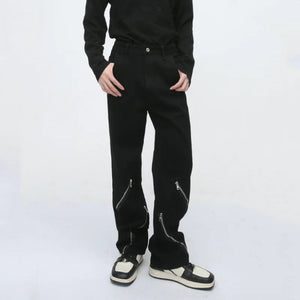 Pantalón negro estilo punk con cremallera