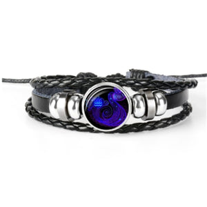 Zodiac Glow Y2K Bracelet with the Aquarius water-bearer cabochon, front view on white with braided bands