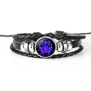 Zodiac Glow Y2K Bracelet with the Cancer crab cabochon, front view on white with braided bands