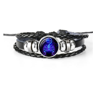 Zodiac Glow Y2K Bracelet with the Scorpio scorpion cabochon, front view on white with braided bands