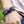 Zodiac Glow Y2K Bracelet worn on the wrist, close-up of the domed Aries cabochon and loose cord ends