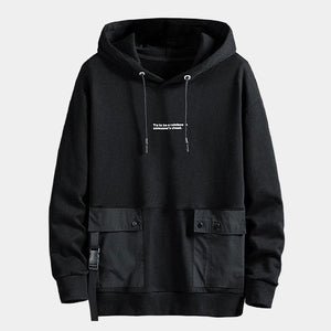 A black hooded Techwear hoodie with front pockets and drawstrings.